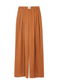 Spodnie typu wide-leg w kolorze rdzy. Posiadają plisowany fason, elastyczny pas oraz gładką strukturę. Brak dodatkowych wzorów i elementów ozdobnych.