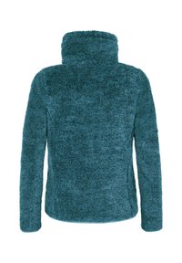 Minkštas, tekstūruotas audinys. Aukštas apykaklė ir ilgos rankovės. Iš nugaros matoma apvali apačia, be matomų užsegimų.