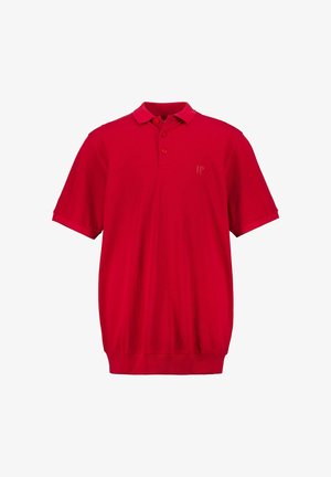 Polo en coton rouge avec un col classique, des manches courtes, une patte de boutonnage à trois boutons et un petit logo sur la poitrine gauche.