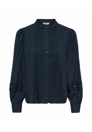 Blouse bleu marine à manches longues avec bordure en dentelle florale sur le devant, aux poignets et autour du milieu des manches, dotée d'épaules bouffantes froncées et d'une fermeture à boutons.