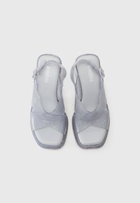 Melissa Aukštakulniai sandalai - clear/blue