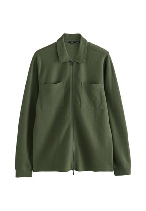 Groen jack met rits gemaakt van gestructureerde stof, voorzien van een kraag, twee borstzakken en lange mouwen, met een rechte snit en zonder versieringen.