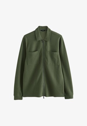 Groen jack met rits gemaakt van gestructureerde stof, voorzien van een kraag, twee borstzakken en lange mouwen, met een rechte snit en zonder versieringen.