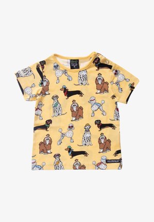 Yellow short-sleeve toddler shirt with colorful dog illustrations wearing hats and accessories, labeled "VILLERVALLA" on the bottom right hem.