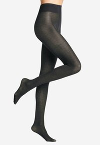 Calze nere a fantasia con design esagonale, costruzione senza cuciture e vita solida per il comfort. Realizzate in materiale opaco.