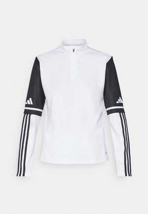 Witte sportieve pullover met een halve rits kraag, lange zwarte mouwen met drie witte strepen en het Adidas-logo op de schouders.
