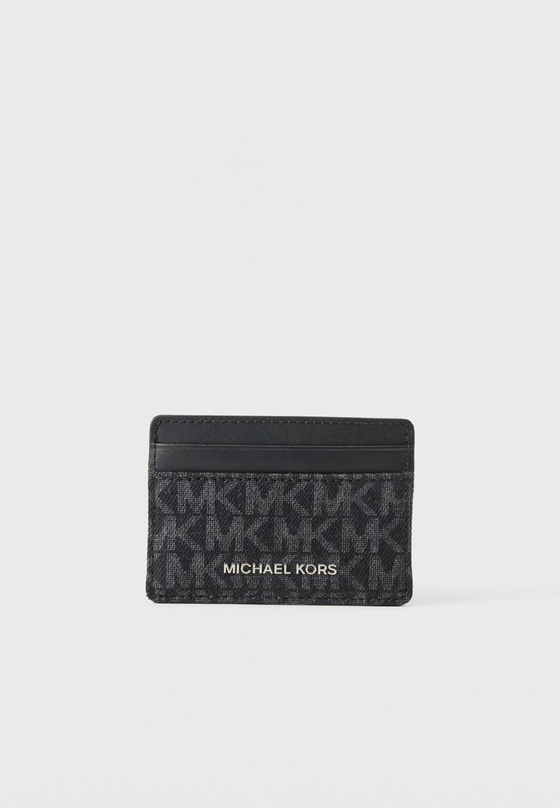 Μαύρος και σκούρος γκρι θήκη καρτών Michael Kors με πολλαπλές θήκες για κάρτες και μοτίβο λογότυπου MK στην υφασμάτινη επιφάνεια.