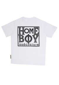 White short-sleeve t-shirt featuring a large black graphic on the back with the text "HOME BOY loud-couture" in bold, textured letters.