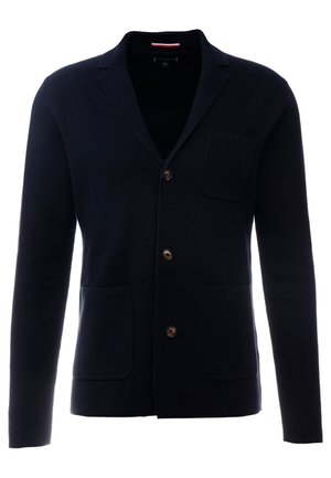 Marineblauer gestrickter Blazer mit drei Knöpfen, Kerbkragen und drei aufgesetzten Fronttaschen.