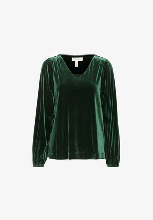 Smaragdgrön sammetströja med lång ärm, V-hals och instoppade ärmar. Mjuk textur och slät yta, designad för en avslappnad passform.