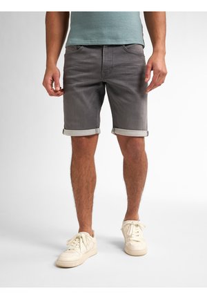 Gray denim shorts with rolled cuffs, featuring a classic five-pocket design. Paired with off-white sneakers. Smooth texture.