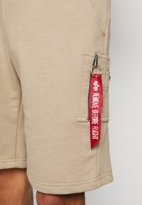 Alpha Industries X-FIT - Tepláky - vintage sand