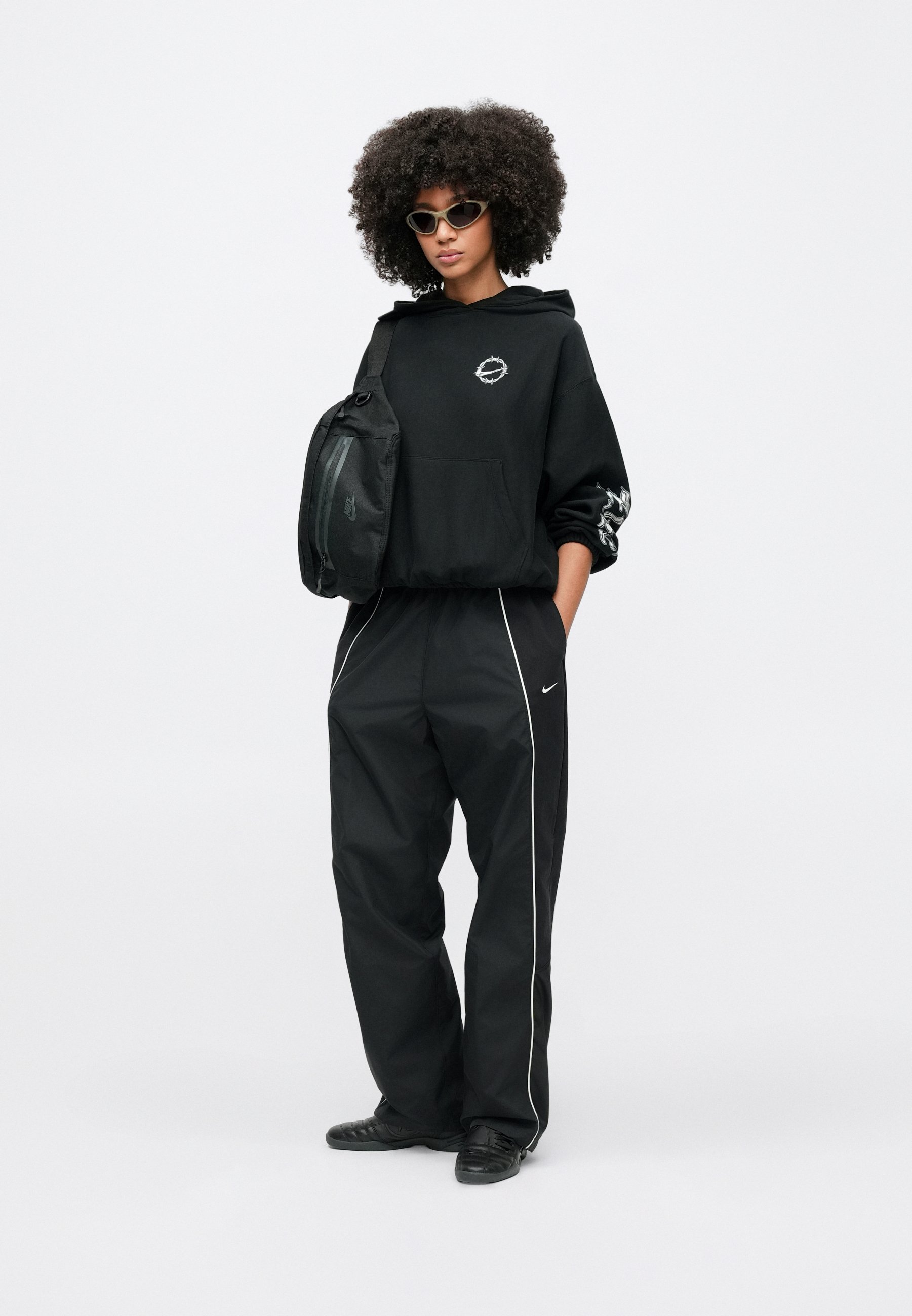plain black nike tracksuit bottoms