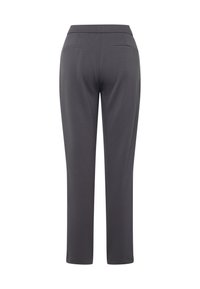 Graue Hose aus weichem Material, mit schmaler Passform und zwei Gesäßtaschen. Der Bund ist elastisch und glatt, ohne Verzierungen.