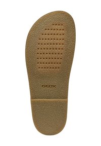 Plantilla GEOX, goma beige, superficie texturizada con perforaciones en patrón para transpirabilidad, forma redondeada, logo de la marca visible.