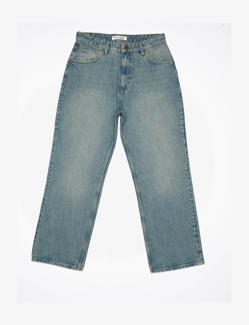 Jasnoniebieskie dżinsy z wysokim stanem i szerokimi nogawkami. Posiadają przednie kieszenie, zamek błyskawiczny oraz widoczne detale wyszycia.