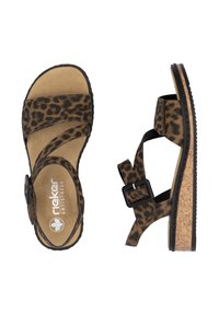 Sandales à imprimé léopard avec deux brides réglables, semelle en liège, semelle intérieure rembourrée, accents noirs, dessus en matériau doux semblable à du daim.