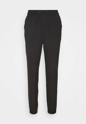JUSTINE - Trousers - black