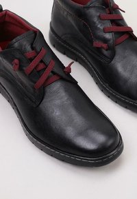 Cossimo Botines con cordones - black