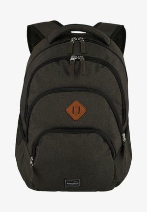 Dark green fabric backpack with multiple zippered compartments, a brown leather accent, mesh side pockets, and padded shoulder straps.