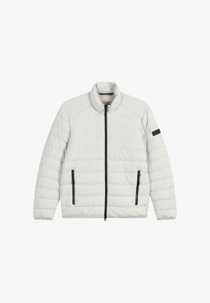 Jasnoszara pikowana kurtka z wysokim kołnierzem, przednim zamkiem błyskawicznym i dwiema czarnymi kieszeniami na zamek. Charakteryzuje się minimalistycznym wzornictwem i pikowaną teksturą.