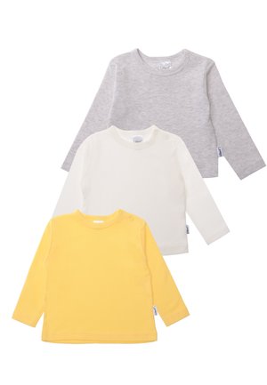 Three long-sleeve shirts: gray, white, and yellow. Each features a round neckline and button detail on the shoulder for easy wear.