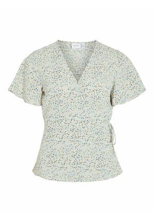 Blusa cruzada beige claro con pequeño estampado floral azul y marrón, mangas cortas con vuelo y lazo lateral en la cintura.