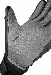 Graue Handschuh mit einer strukturierten Oberfläche, ausgestattet mit einer weichen Lederhandfläche, genähten Akzenten und einer engen Passform im Handgelenkbereich.