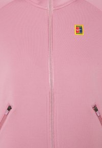 Nike Performance Veste de survêtement - purple