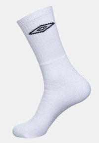 Chaussette en coton blanc avec texture côtelée et un logo noir brodé près du haut. Design hauteur cheville, finition lisse et forme de chaussette standard.