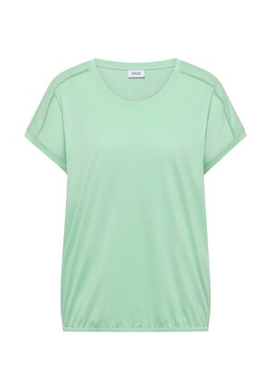 Blouse vert clair à manches courtes avec encolure ronde, bordure en dentelle sur les épaules, ourlet élastique et étiquette de marque "Cecil" à l'intérieur du col.