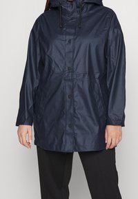 ONLY Carmakoma Regnjacka - dark blue