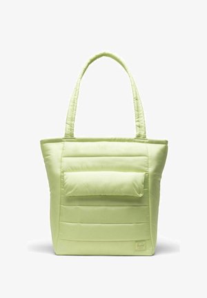 Sac cabas matelassé vert clair avec de longues anses, doté d'une poche avant et d'une texture lisse et douce. Lignes de couture visibles sur le corps.