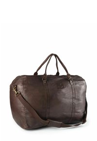 Sac de voyage en cuir marron avec deux poignées supérieures, bandoulière amovible, fermeture éclair et subtil logo en relief.