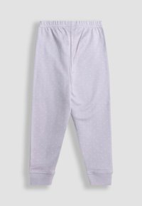 Világoslila leggings, puha anyagból készült, pöttyös mintával, rugalmas derékkal és szűkített mandzsettákkal a bokán.