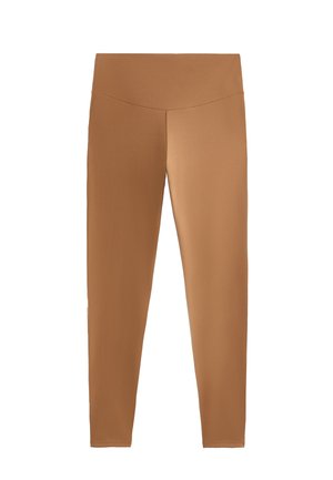 Brązowe legginsy z wysokim stanem wykonane z gładkiego, elastycznego materiału. Projekt charakteryzuje się bezszwowym pasem w talii oraz dopasowanym krojem.