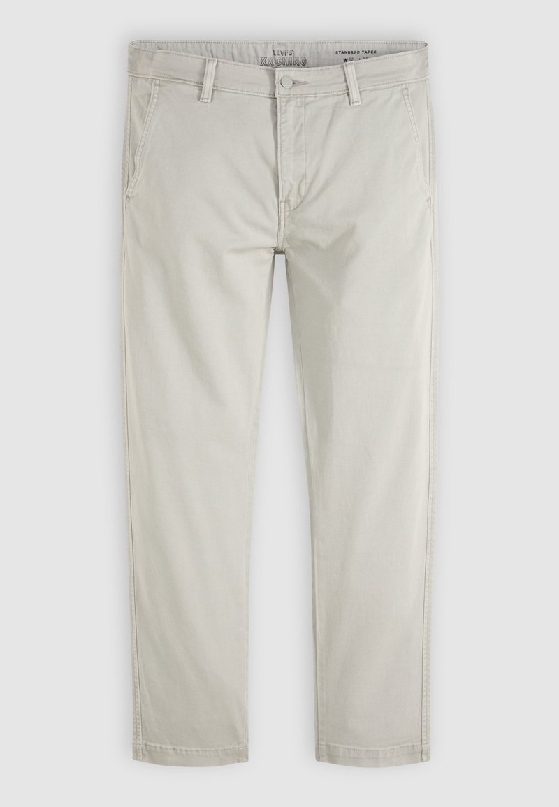 Light beige straight-leg chinos with front pockets, belt loops, button closure, and standard taper fit, displayed flat on a white background.