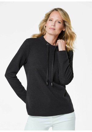 Schwarzer Kapuzenpullover mit strukturiertem, geripptem Design, ausgestattet mit einem Kordelzug mit metallischen Ösen und langen Ärmeln.