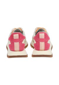 Sneakers featuring a beige upper with pink suede accents, a pink heel tab, and a brown rubber sole. Striped detail on the back.