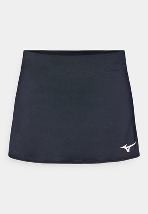 Saia atlética azul escura feita de tecido elástico. Apresenta uma cintura plana e um detalhe logo branco no lado inferior direito.