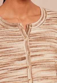 Next Sweter