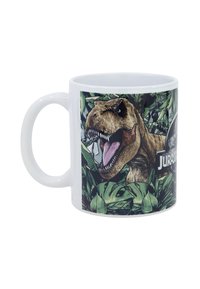 Weißer Keramikbecher mit einem bunten T. Rex-Design, umgeben von grünen tropischen Blättern, mit einem schwarzen "Jurassic"-Logo-Akzent.