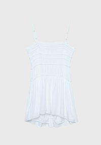 Top blanco sin mangas con textura ajustada, tirantes ajustables y dobladillo acampanado. Presenta un fondo redondeado y una tela ligera.