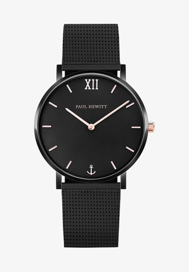 Orologio analogico nero con design minimalista, caratterizzato da una cassa rotonda, quadrante nero, dettagli in oro rosa e un cinturino nero texturizzato.