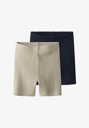 Zwei Paar gerippte Shorts, einmal in Beige und einmal in Marineblau. Beide verfügen über eine weiche Textur und einen elastischen Bund für zusätzlichen Komfort.