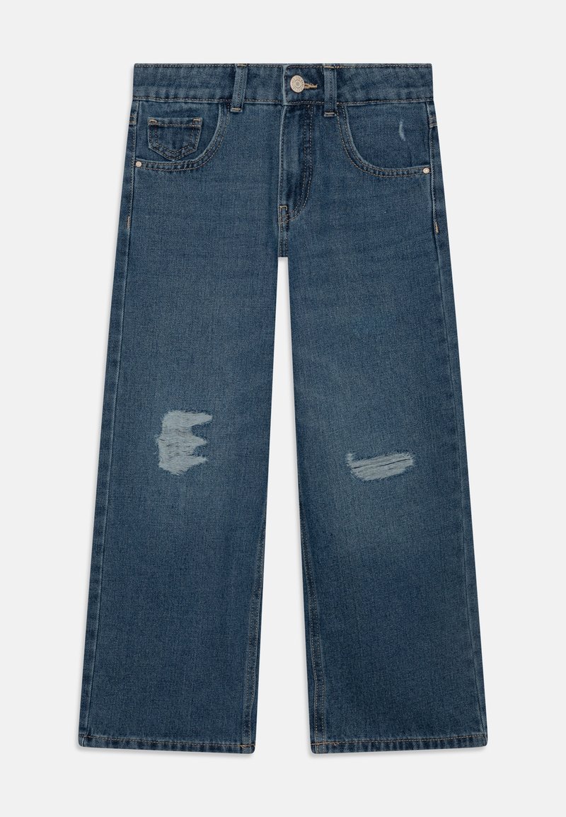 Jean en denim bleu à jambes larges avec des patchs usés sur les deux jambes, fermeture boutonnée à l'avant et cinq poches.