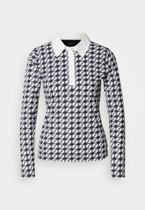 Long-sleeve polo shirt with a houndstooth pattern in navy and white. Features a white collar and button placket, made of a smooth fabric.