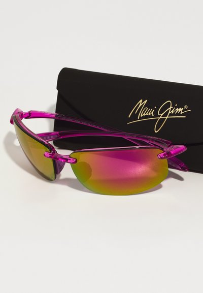 Maui Jim prillid roosade raamidega ja gradientobjektiividega, kergesti kandmiseks disainitud. Kaasas must brändiga karp.