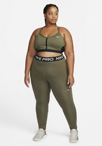 Nike Performance PLUS - Leggings - medium olive/black