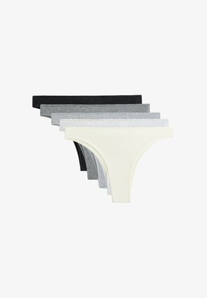 Vijf paren naadloze ondergoed in zwart, donkergrauw, lichtgrijs en wit, met een gladde textuur en een stringontwerp.